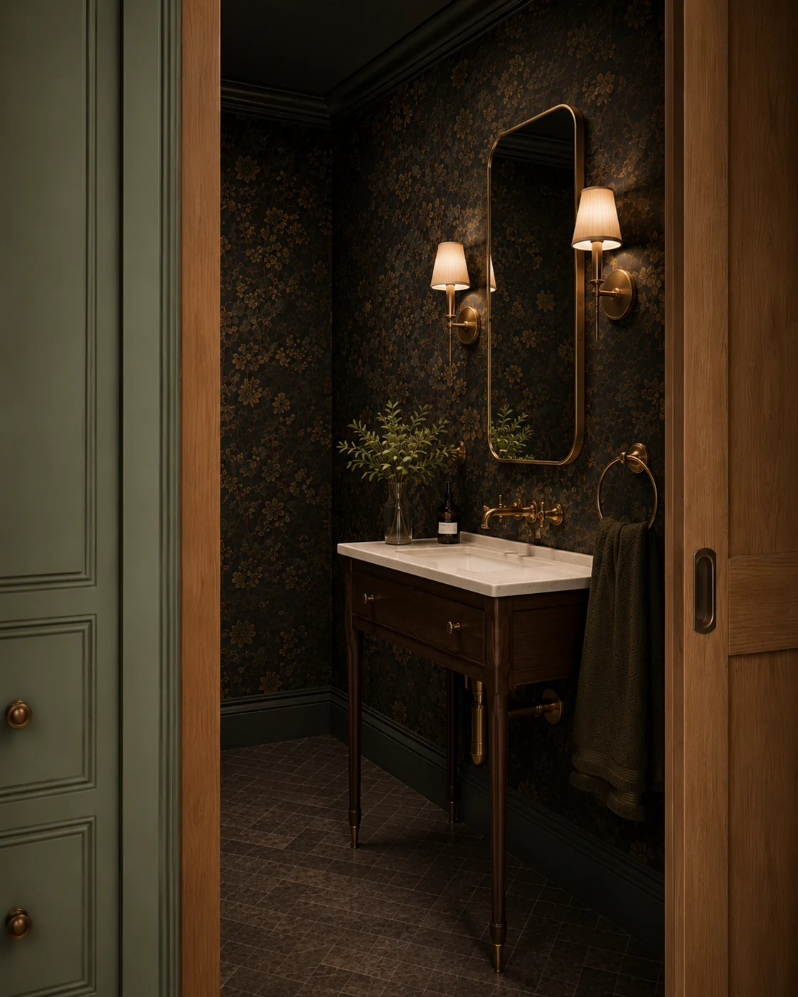 Powder room design study with dark floral wallcovering, brass sconces and refined washstand
